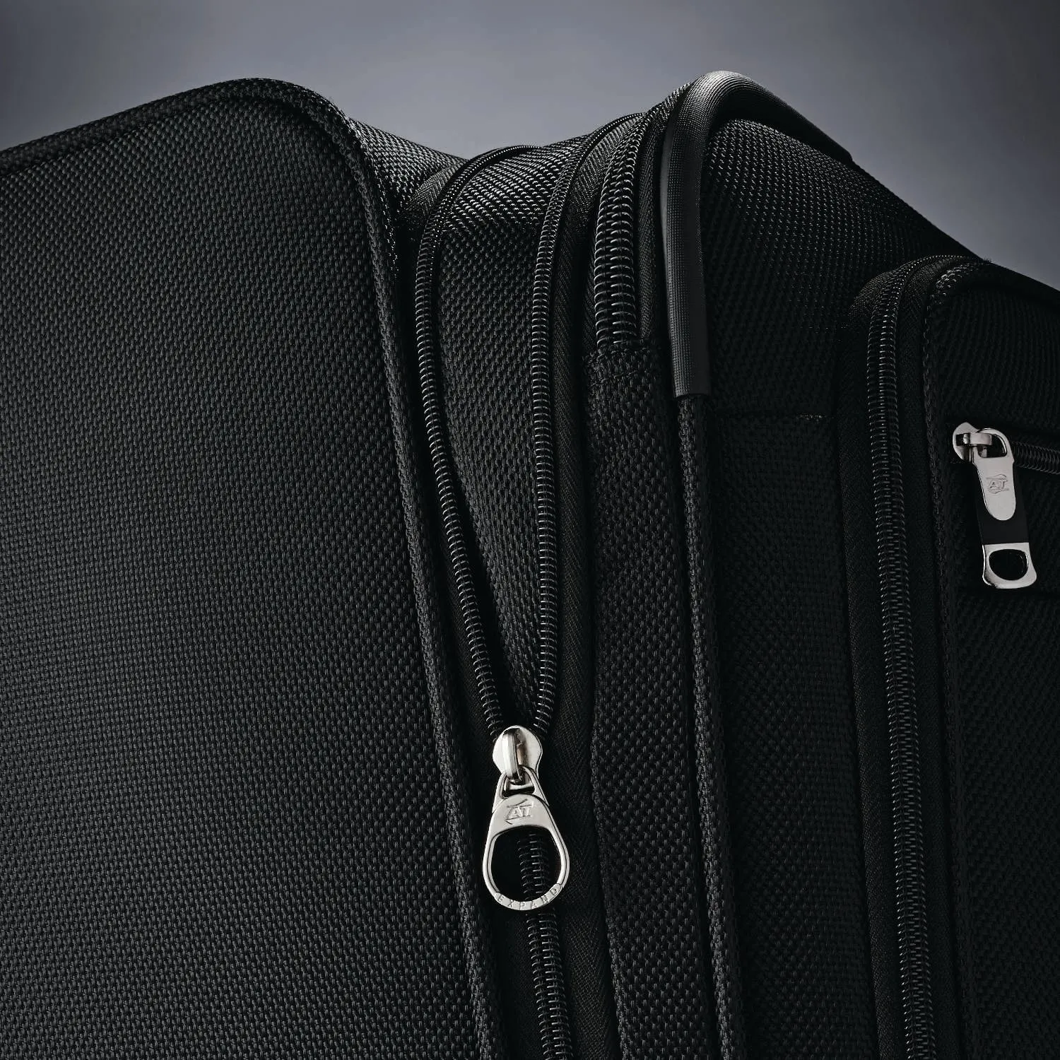 American Tourister Triumph DLX 21" 4-Wheel Carry-On Luggage