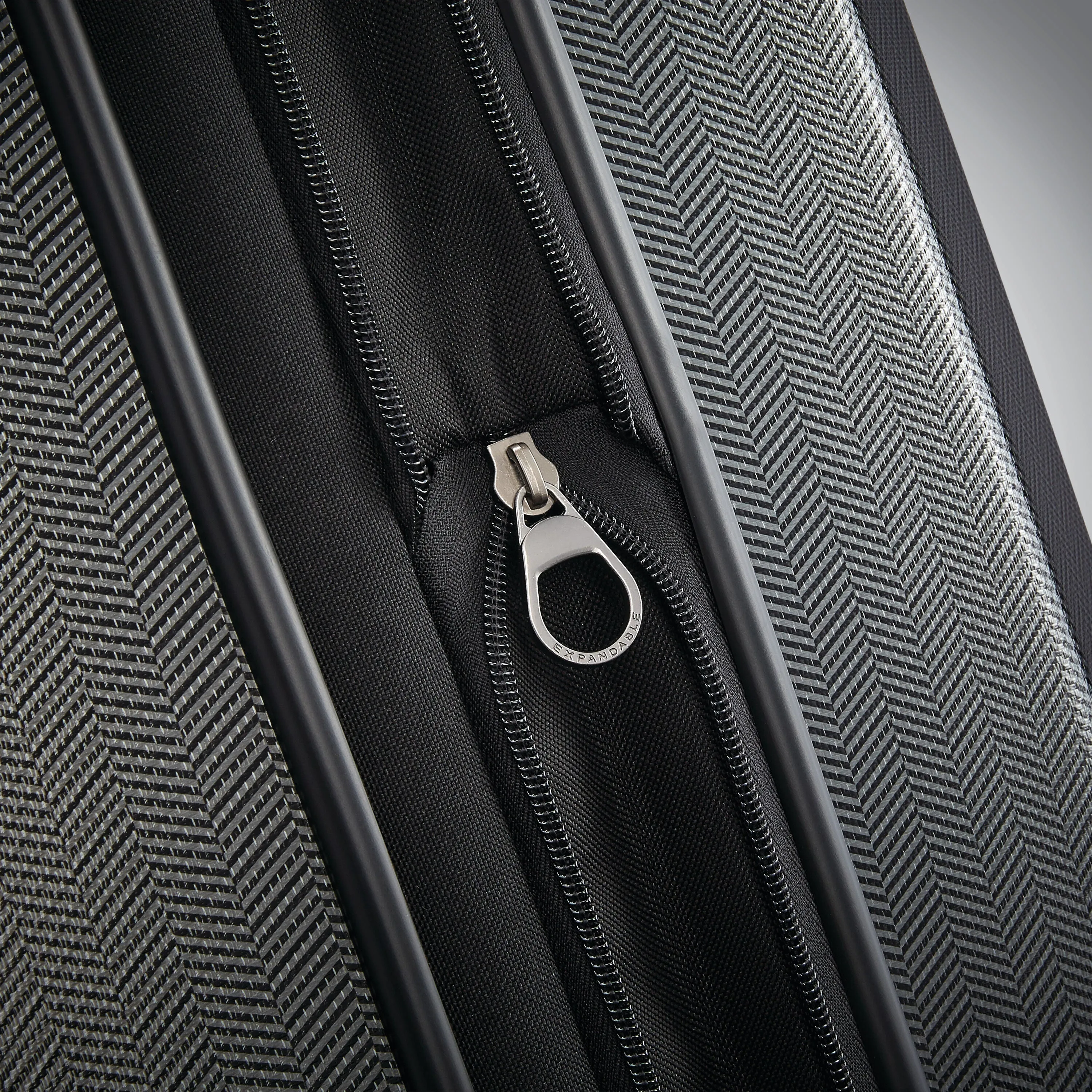 Century Deluxe Expandable Spinner Carry-On